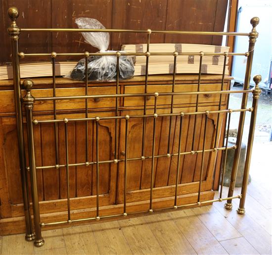 A brass framed bed W.145cm